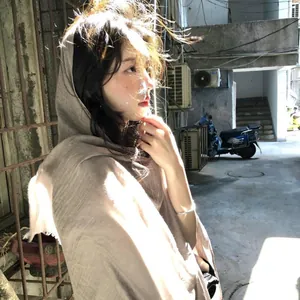 Linen cotton scarf wrapped around woman in retro style