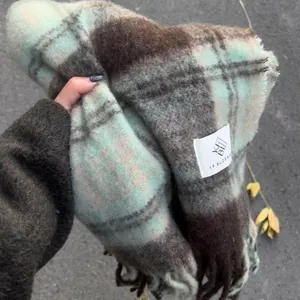 Soft mohair plaid scarf in green and brown check with stylish tassel fringe detail