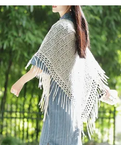 Elegant white knitted hollow-out triangle shawl with long tassels for retro outfits