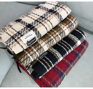 Folded soft plaid cashmere-like scarves in vintage colors