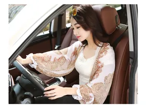 Detailed view of lightweight chiffon sun protection shawl with elegant paisley print
