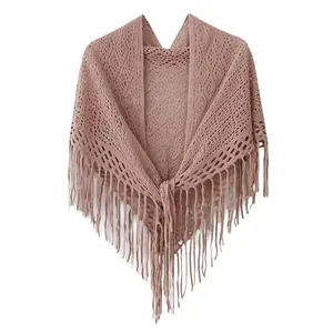 Elegant retro knitted hollow-out triangle shawl with long tassels in mauve pink.
