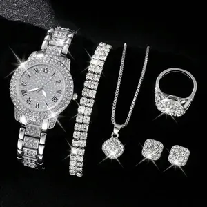 Detailed view of silver-toned rhinestone-encrusted watch and matching jewelry set