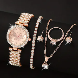 Detailed view of an elegant women's rose gold quartz watch and matching jewelry set