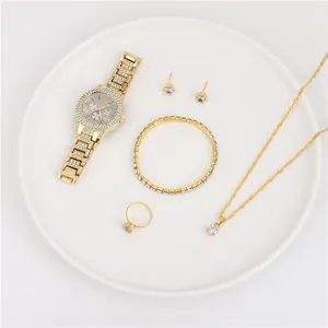 Luxury women's gold-tone quartz watch and jewelry set with necklace, bracelet, and ring