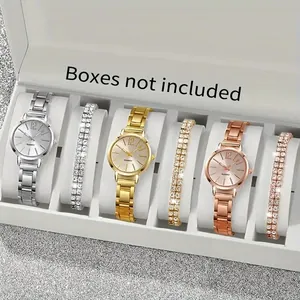 Detailopname van zilveren, gouden en roségouden kwartshorloges met bijpassende armbanden.