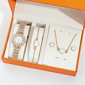 Élégante montre femme or strass et ensemble bijoux cœur dans un coffret orange