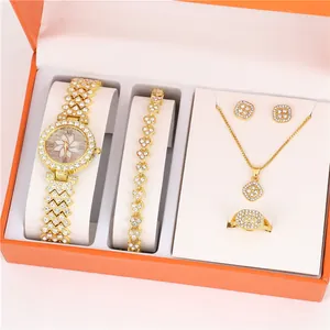 Elegant 5-piece women's gold-tone jewelry set with rhinestone quartz watch and necklace.