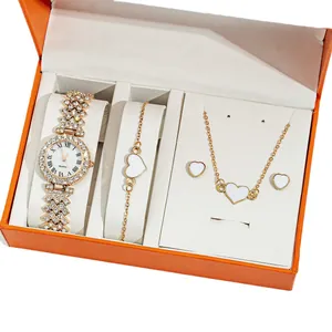 Élégant coffret montre dorée strass et bijoux cœur pour femme dans une boîte orange