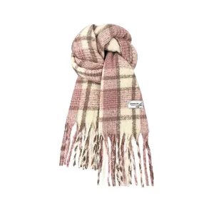 Soft pink mohair plaid scarf with fringes for winter warmth and elegant styling.