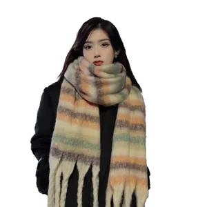 High quality thick mohair style striped scarf with tassels shown on an Asian model