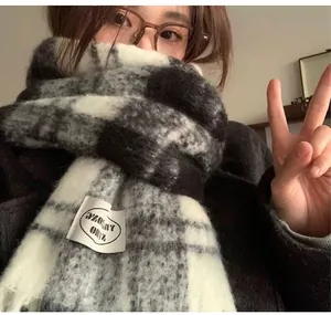 Cozy black and white Icelandic plaid mohair scarf for winter outdoor daily wear.