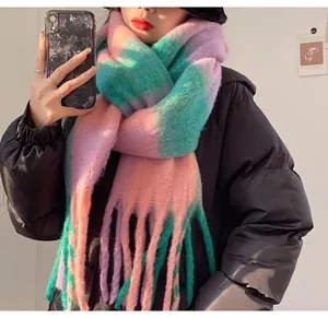 Cozy mohair plaid scarf for women in pink and teal featuring chunky long tassels