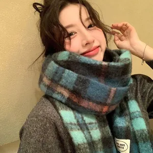 Cozy mohair plaid scarf in Iceland blue worn by model, warm winter shawl wrap