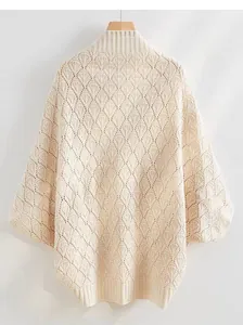 Back view detail of cream hollow knit shawl cardigan with elegant diamond pattern