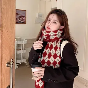 Festive red and white argyle knitted winter scarf for women in cozy cafe setting