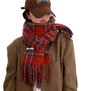 Stylish cozy red plaid cashmere feel scarf for women in a warm autumn winter outfit