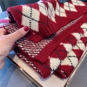 Red and white argyle knit scarf for Christmas season lifestyle view