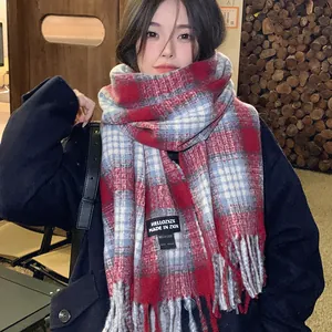 Elegant winter red plaid scarf for women featuring soft cashmere-like texture and tassels