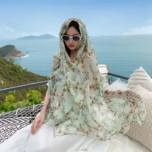 Floral printed Bali yarn sun protection shawl for beach in light green variant