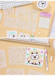 Close-up of cute cartoon bear PET painting stencil showing hollowed details and finished drawing