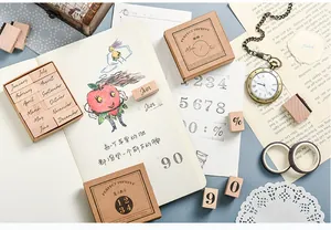 Close-up of wooden calendar and number stamps for scrapbooking decoration
