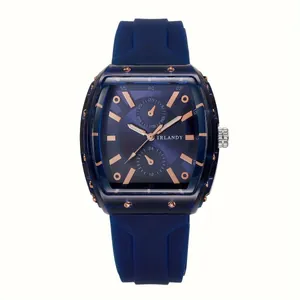 Detailed view of men's blue quartz watch with silicone strap and rose gold accents