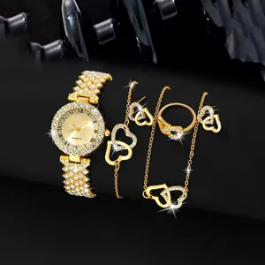 Luxury gold-tone women's jewelry set featuring a rhinestone-encrusted quartz watch and heart jewelry