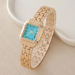 Orologio al quarzo quadrato elegante da donna con quadrante turchese e cinturino oro