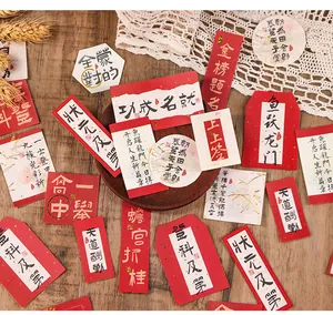 Detail view of traditional Chinese stickers featuring elegant gold foil calligraphy