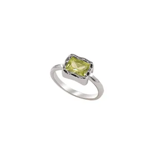 Geometric silver-plated ring featuring a rectangular lime green emerald-cut crystal center