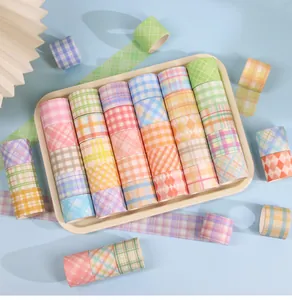 Premium set of 60 colorful plaid washi tapes organized in a tray for DIY scrapbooking.