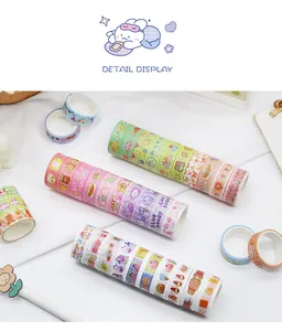 Detail view of various colorful cartoon washi tape rolls for journaling and scrapbooking