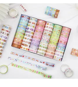 Variety set of colorful cartoon washi tapes in a white gift box for creative journaling