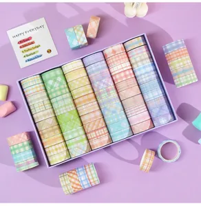 Detailed overhead view of 60 rolls of pastel plaid washi tapes in a purple gift box