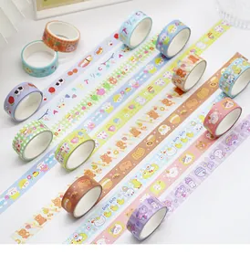 Detail view of colorful cartoon printed washi tapes in various cute patterns