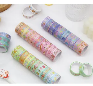 Collection of colorful cute cartoon washi tape rolls for scrapbooking and DIY