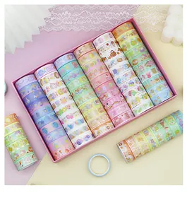 Detail showing a variety of 60 colorful cute cartoon washi tapes in a pink gift box