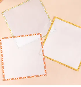 Detail view of heat-resistant ironing paper for Perler beads with decorative borders.