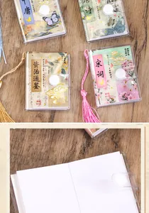 Detailweergave van mini-notitieboekjes in Chinese stijl met blanco pagina's en kwastjes