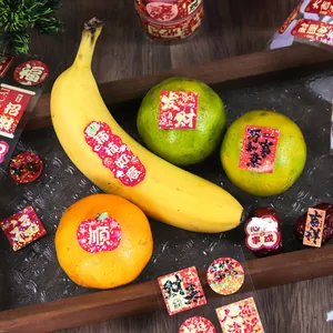 Festive Chinese New Year gold foil stickers with blessing characters for gift sealing