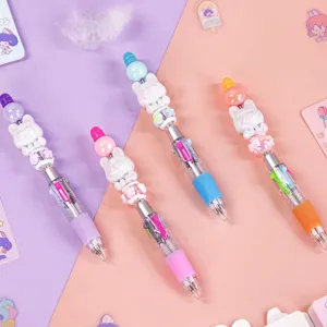 Set van vierkleuren balpennen met schattige cartoon pop bedeltjes voor studenten cadeau