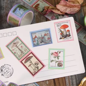 Vintage style washi tape and postage stamp stickers for scrapbooking decoration