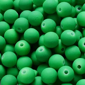 Macro view of 8mm matte green acrylic beads for DIY jewelry and hair accessories