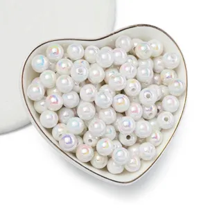 Macro view of 8mm white AB coated acrylic round beads for DIY jewelry making
