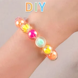 Detailed shot of a colorful AB acrylic beads bracelet on a wrist for DIY jewelry crafts