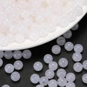 Detailed view of white translucent acrylic jelly round beads for DIY jewelry beading