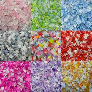 Assorted acrylic flower and leaf beads displayed in a nine-grid vibrant color-themed layout