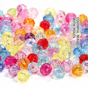 Detailed macro view of colorful faceted acrylic beads for DIY jewelry making crafts