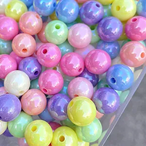 Detailed macro shot of colorful pearlescent acrylic beads for DIY handmade jewelry crafts